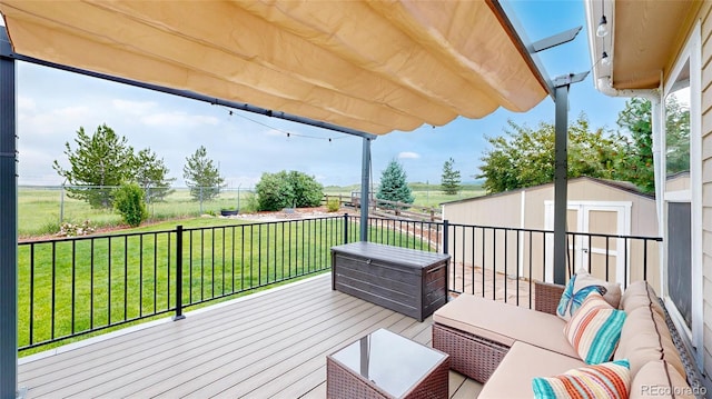 7270 Marmot Ridge Pl, Littleton, CO 80125 - deck featuring a shed, a yard, and an outdoor living space