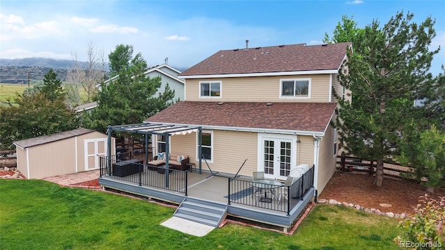 7270 Marmot Ridge Pl, Littleton, CO 80125 - rear view of house featuring roof with shingles, a shed, a pergola, and a wooden deck