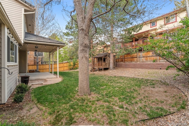 8132 Lodgepole Trl, Lone Tree, CO 80124 - fenced backyard with a shed and a patio