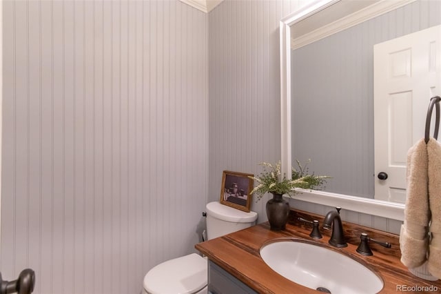 8132 Lodgepole Trl, Lone Tree, CO 80124 - bathroom featuring vanity, ornamental molding, and wallpapered walls