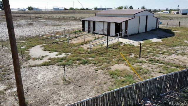 215 7th Ave, Deer Trail, CO 80105 - view of outbuilding with an exterior structure and a rural view