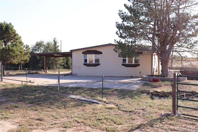 view of home's exterior with a patio