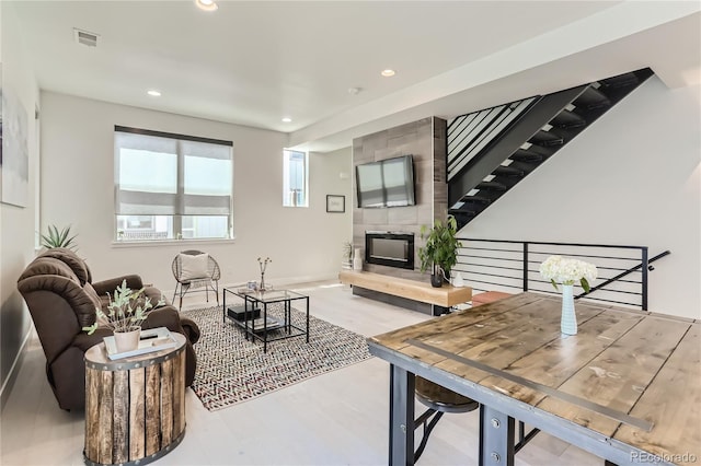 4100 E Iliff Ave Unit 4, Denver, CO 80222 - living room with recessed lighting, a large fireplace, and baseboards