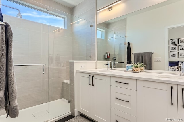 4100 E Iliff Ave Unit 4, Denver, CO 80222 - full bathroom featuring a shower stall and double vanity