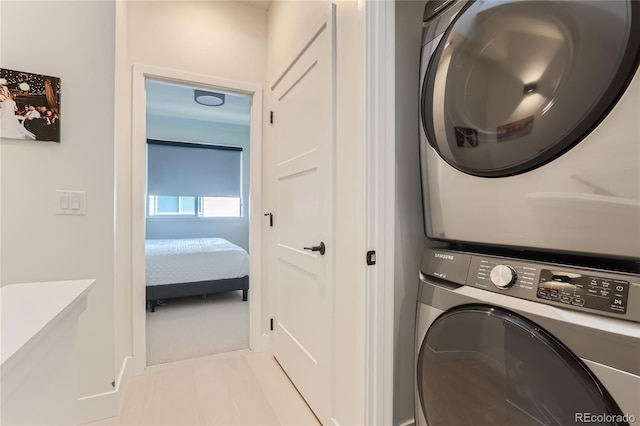 4100 E Iliff Ave Unit 4, Denver, CO 80222 - laundry area featuring estacked washer and dryer