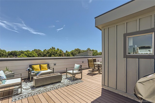 4100 E Iliff Ave Unit 4, Denver, CO 80222 - wooden terrace with an outdoor living space