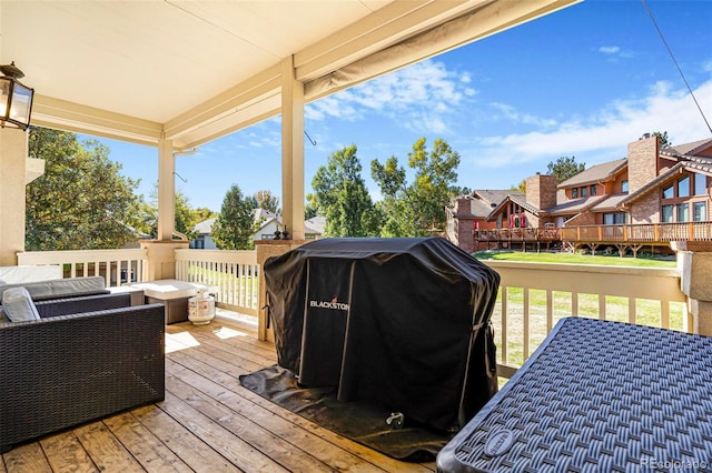 wooden terrace with grilling area