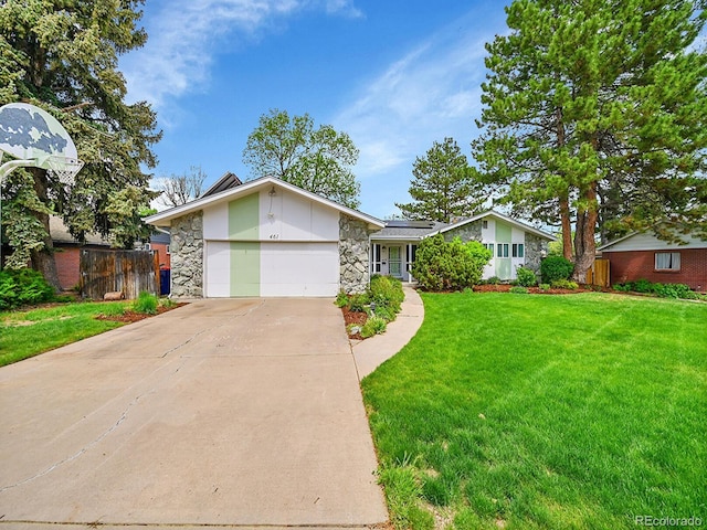 461 Nome St, Aurora, CO 80010 - mid-century home with stone siding, a garage, roof mounted solar panels, and driveway