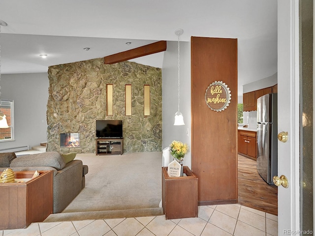 461 Nome St, Aurora, CO 80010 - living area with light tile patterned flooring, a stone fireplace, and a baseboard radiator