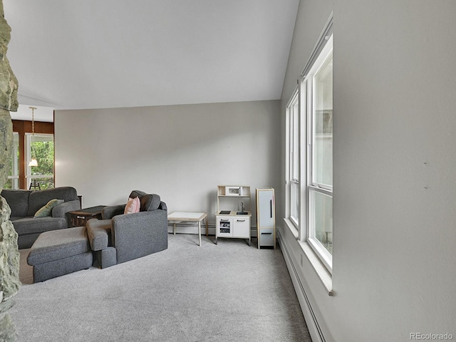 461 Nome St, Aurora, CO 80010 - carpeted living area featuring a baseboard radiator