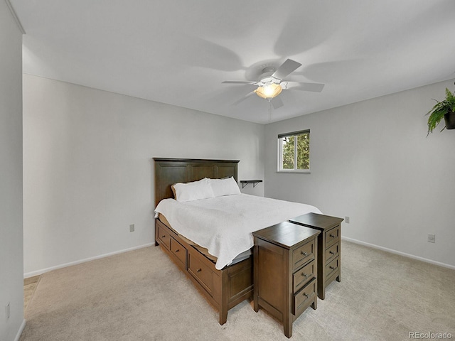 461 Nome St, Aurora, CO 80010 - bedroom featuring light colored carpet, baseboards, and ceiling fan