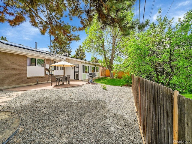 461 Nome St, Aurora, CO 80010 - fenced backyard with a patio