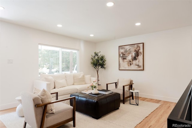 2257 S Lowell Blvd, Denver, CO 80219 - living room with light wood-style floors and recessed lighting