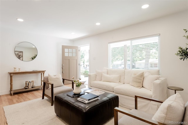 2257 S Lowell Blvd, Denver, CO 80219 - living area with light wood-style floors and recessed lighting