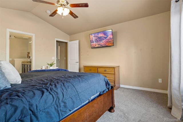 carpeted bedroom featuring ensuite bathroom, ceiling fan, and vaulted ceiling