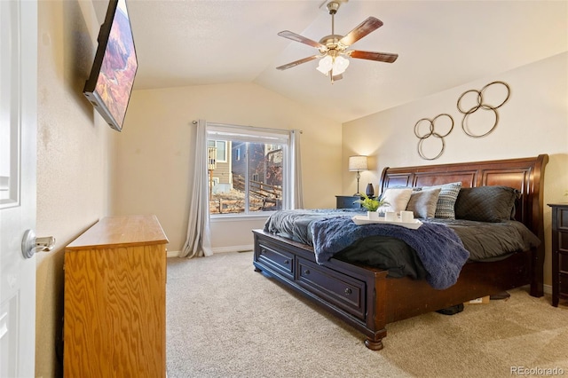 carpeted bedroom featuring ceiling fan and lofted ceiling