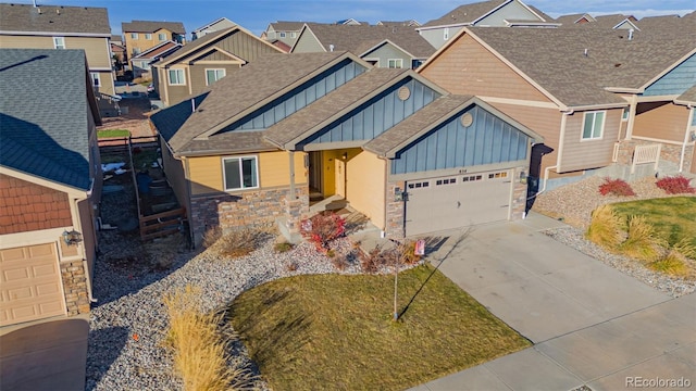 craftsman-style home with a front yard