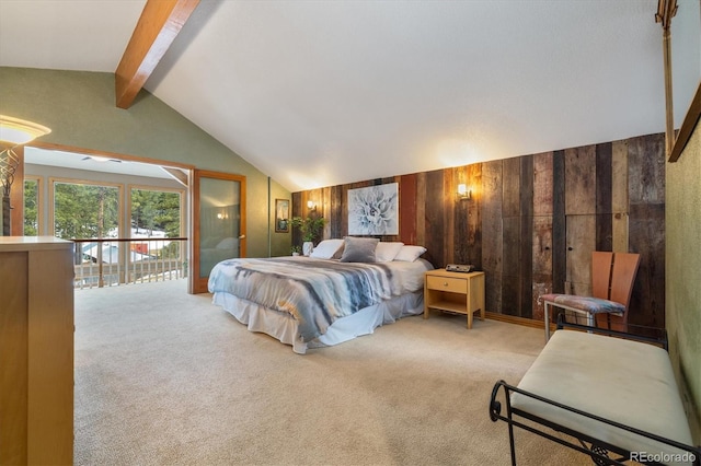 carpeted bedroom with access to exterior, vaulted ceiling with beams, and wood walls