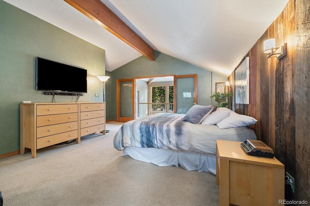 carpeted bedroom featuring lofted ceiling with beams