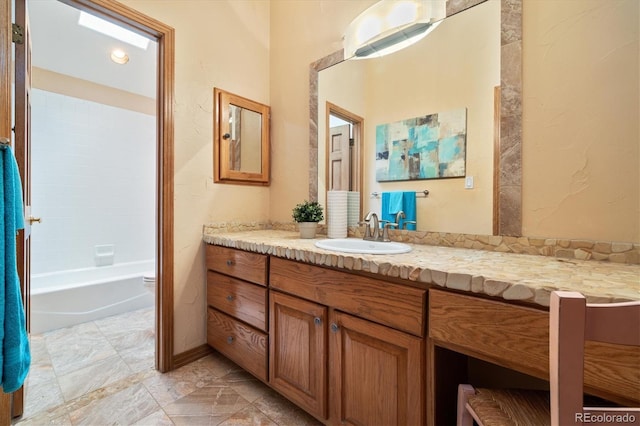 full bath with toilet, shower / bathing tub combination, and vanity