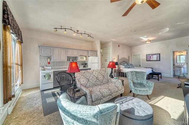 living room with light carpet and ceiling fan