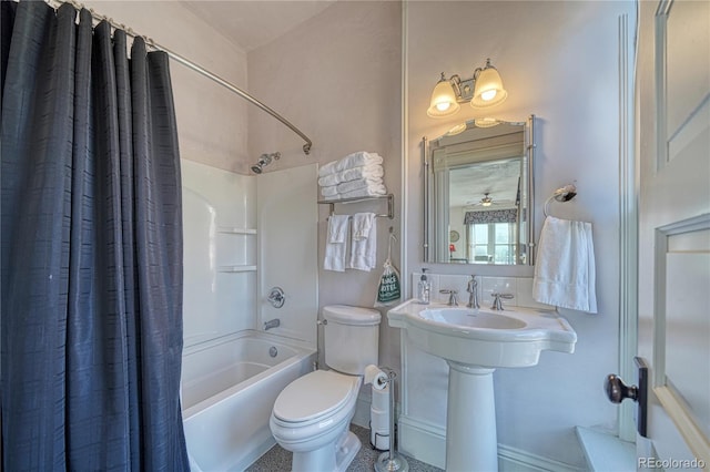 bathroom with toilet and shower / tub combo