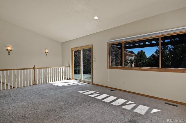 5130 Sevenoaks Dr, Colorado Springs, CO 80919 - carpeted spare room featuring baseboards, vaulted ceiling, and visible vents