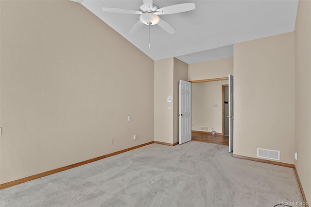 5130 Sevenoaks Dr, Colorado Springs, CO 80919 - unfurnished bedroom featuring light colored carpet, visible vents, baseboards, and vaulted ceiling