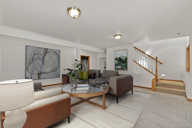 5130 Sevenoaks Dr, Colorado Springs, CO 80919 - living area with light colored carpet, baseboards, and stairs