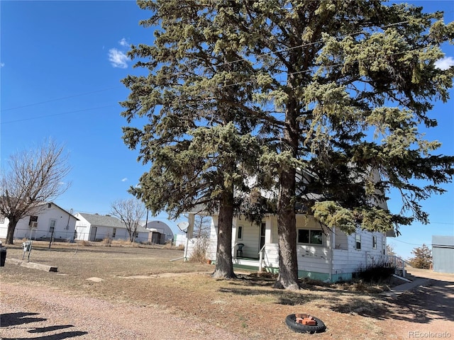 view of side of property with fence