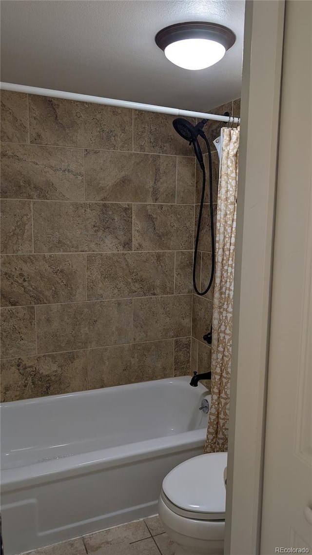 2710 Ryan Gulch Rd Unit 2731, Silverthorne, CO 80498 - full bath featuring toilet, shower / tub combo with curtain, and tile patterned floors