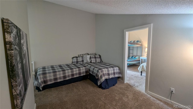 2710 Ryan Gulch Rd Unit 2731, Silverthorne, CO 80498 - bedroom with carpet floors and a textured ceiling