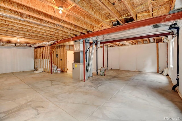 basement featuring heating unit