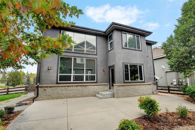 view of front of property with a patio