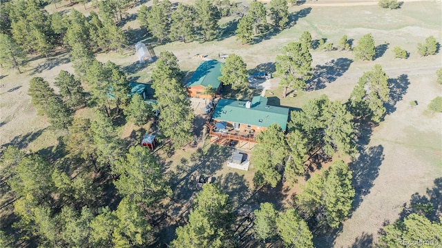 birds eye view of property featuring a rural view