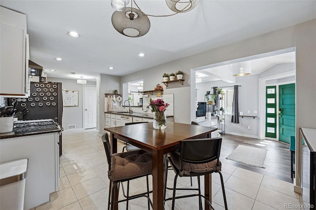 dining space with recessed lighting, visible vents, baseboards, and light tile patterned floors