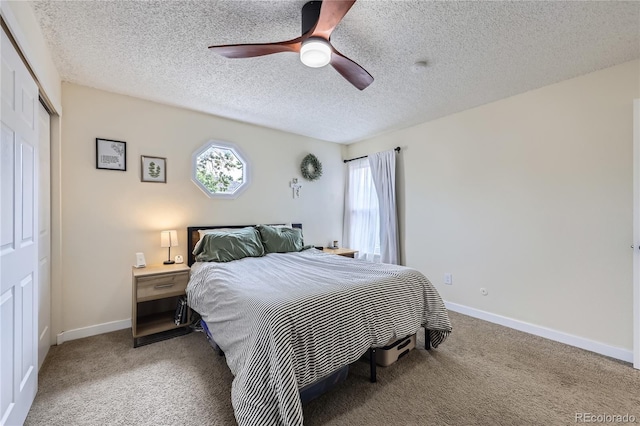 12131 Melody Dr Unit 201, Denver, CO 80234 - bedroom with light carpet, a closet, a textured ceiling, and a ceiling fan