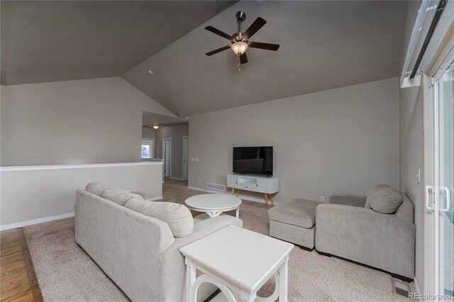 8110 Somersby Pl, Colorado Springs, CO 80908 - living area featuring a ceiling fan, vaulted ceiling, baseboards, and wood finished floors