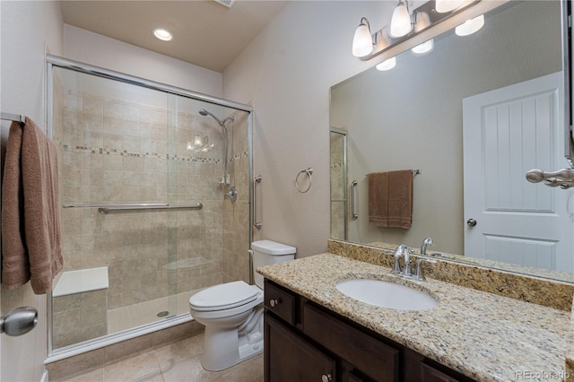 8110 Somersby Pl, Colorado Springs, CO 80908 - full bathroom with toilet, vanity, a shower stall, and tile patterned floors