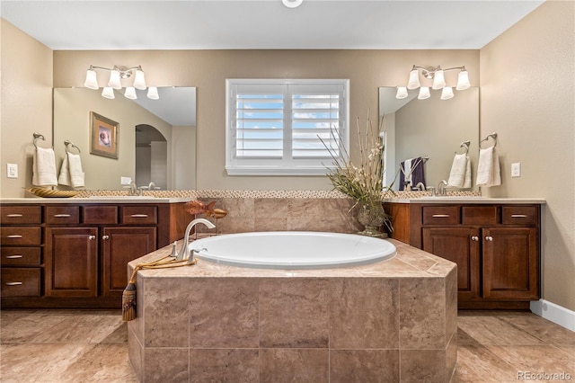 1133 Lucky Ct, Castle Rock, CO 80109 - bathroom with two vanities and a bath