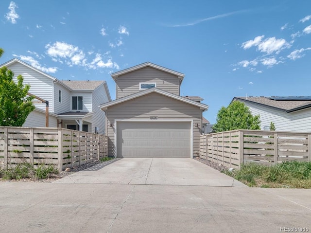 8018 Williams Fork Ave, Littleton, CO 80125 - traditional home with driveway and fence