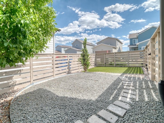 8018 Williams Fork Ave, Littleton, CO 80125 - fenced backyard with a residential view and a patio area