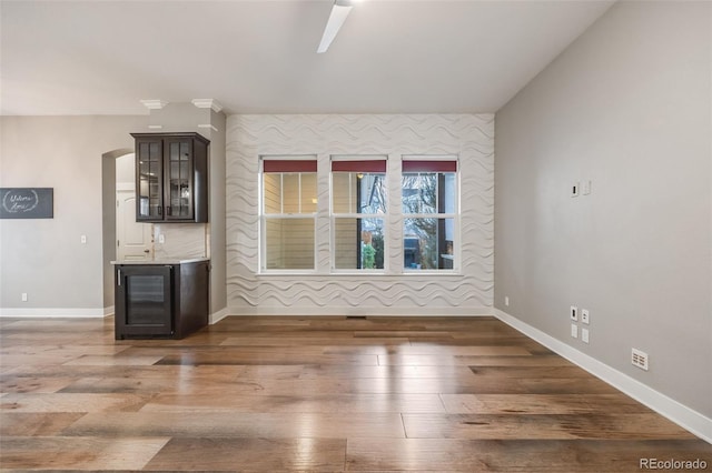 unfurnished living room featuring dark hardwood / wood-style floors