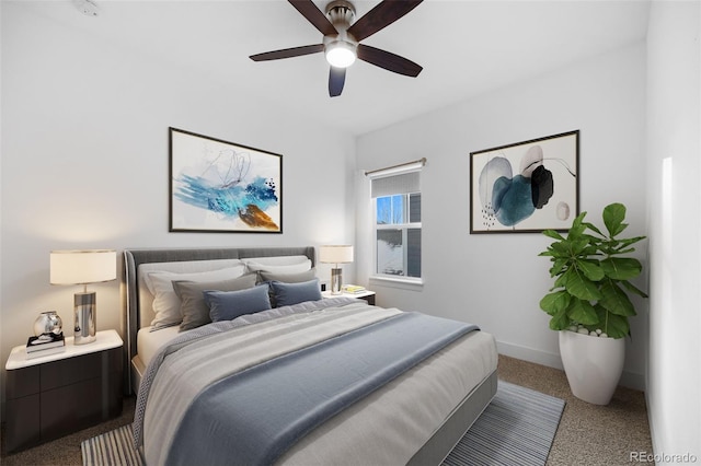 bedroom with ceiling fan and carpet floors