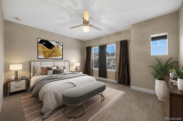 bedroom with ceiling fan and carpet