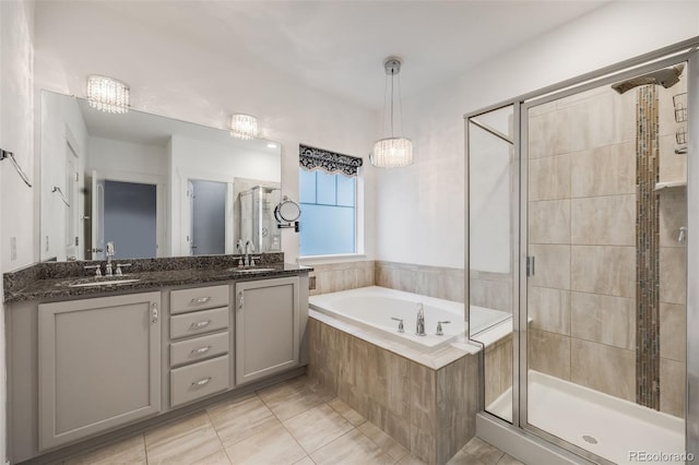 bathroom featuring vanity, tile patterned floors, and independent shower and bath