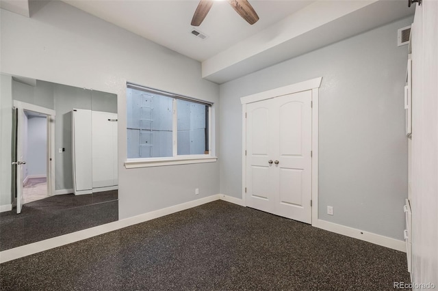 unfurnished bedroom featuring a closet and ceiling fan