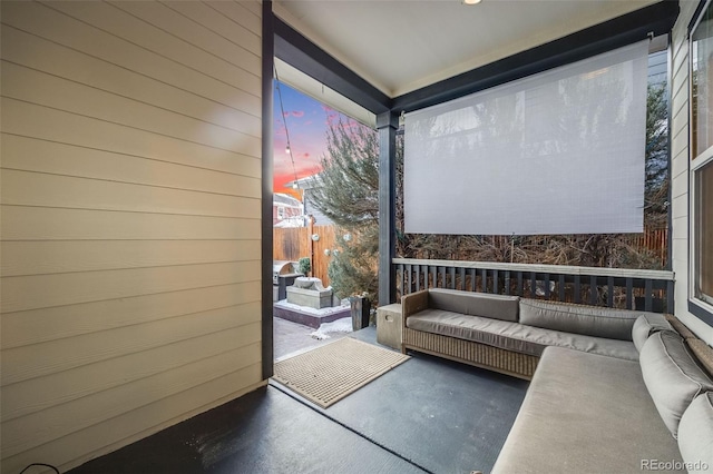 interior space with wooden walls and concrete floors