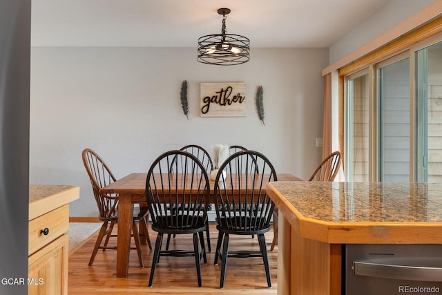 129 Logger Ln, Winter Park, CO 80482 - dining area featuring light wood-style flooring and a chandelier