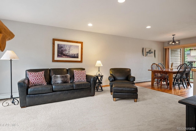 129 Logger Ln, Winter Park, CO 80482 - carpeted living room featuring recessed lighting and a baseboard radiator